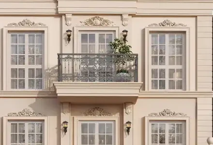 Wrought-iron balcony and carved facade ornament at Godrej Florenne